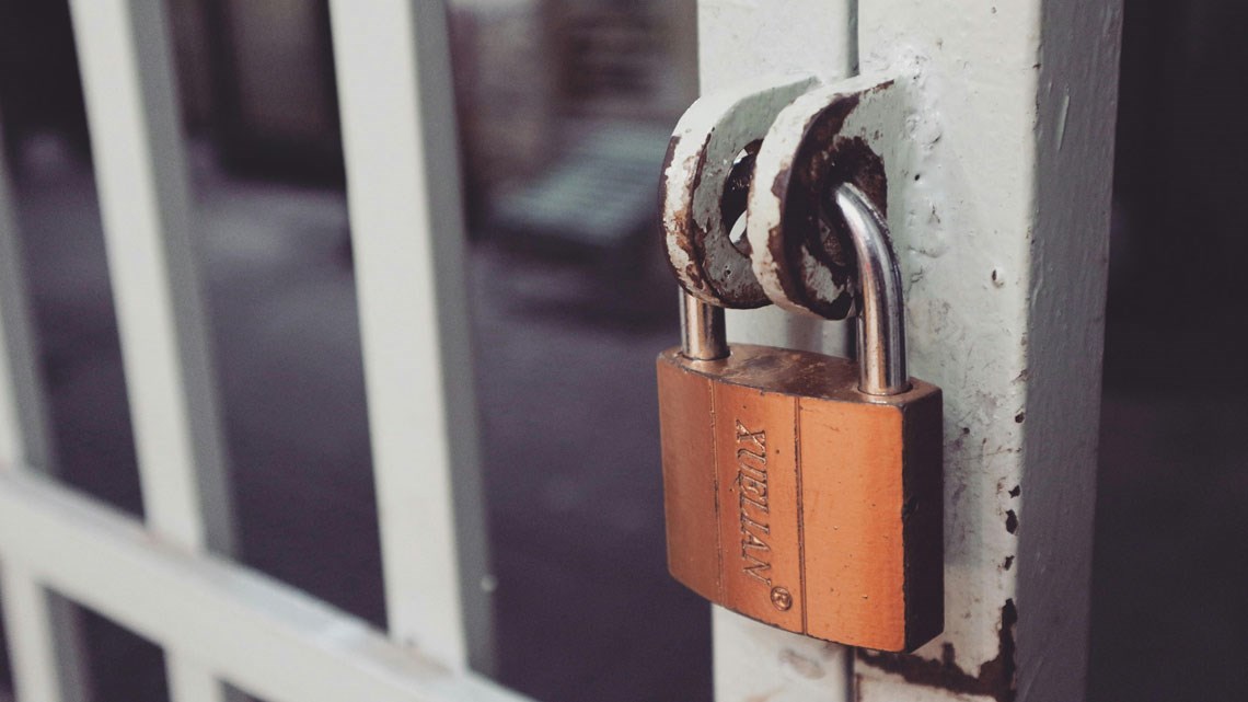 padlock on iron gate